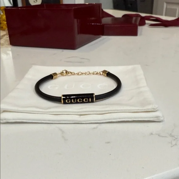 Gucci Black Bracelet with Gold Chain purchased 8/25/2025 - Picture 3 of 5